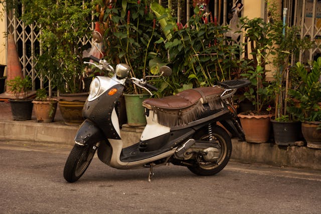modern scooter parked showing fuel efficient scooter design mileage comparison commuting vehicle